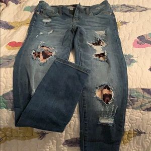 Stretchy skinny jeans with leopard distress